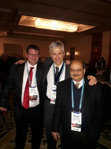 With Praveen Kumar and Martyn Clark, 2018